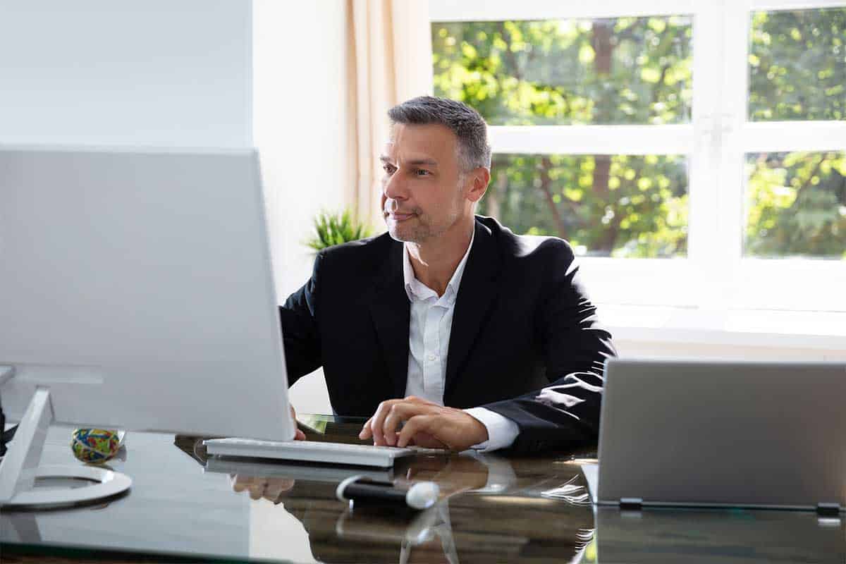 Businessman-Working-On-Computer Business-Man Working On Computer
